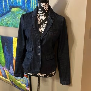 Pilcro and the Letterpress jean blazer with two button front closure.